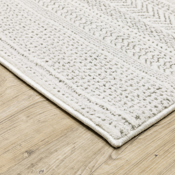 5' x 8' White and Grey Geometric Power Loom Stain Resistant Area Rug