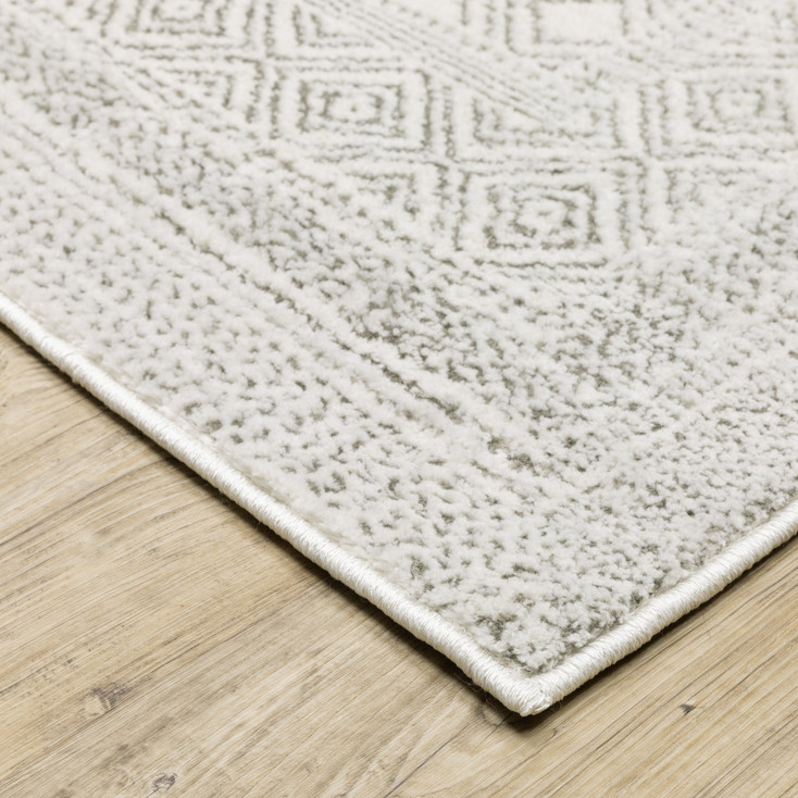 5' x 8' White and Grey Oriental Power Loom Stain Resistant Area Rug