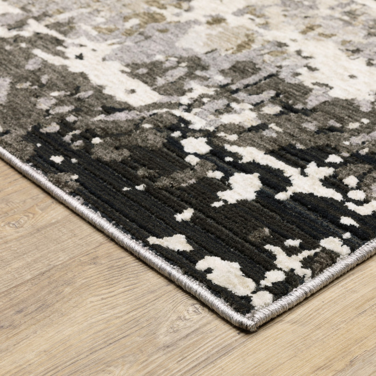 5' x 8' Grey Ivory Beige Charcoal Black Tan and Brown Abstract Power Loom Area Rug