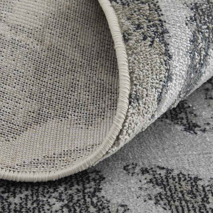 5' x 8' Gray Silver and Ivory Abstract Power Loom Area Rug