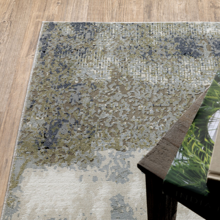 5' x 8' Blue Green Grey and Beige Abstract Power Loom Stain Resistant Area Rug