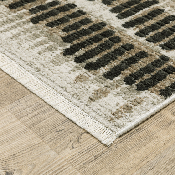 5' x 8' Beige Ivory Charcoal Brown Tan and Grey Abstract Power Loom Area Rug with Fringe