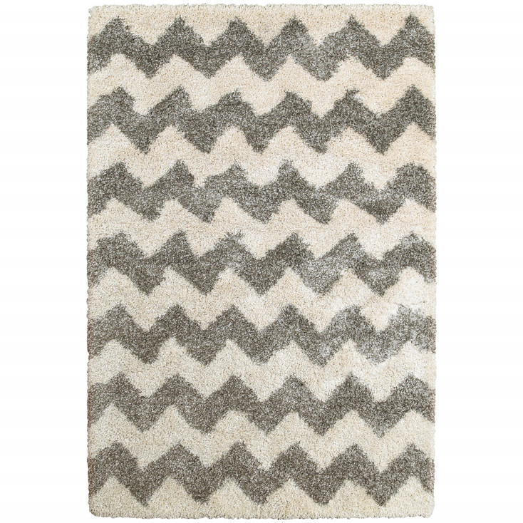 5' x 8' Grey and Ivory Geometric Shag Power Loom Polypropylene Area Rug