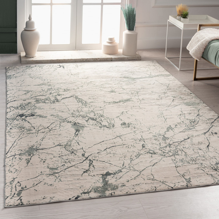 5' x 8' Ivory Abstract Area Rug