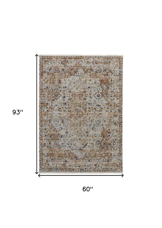 5' x 8' Tan Ivory and Orange Floral Power Loom Area Rug with Fringe
