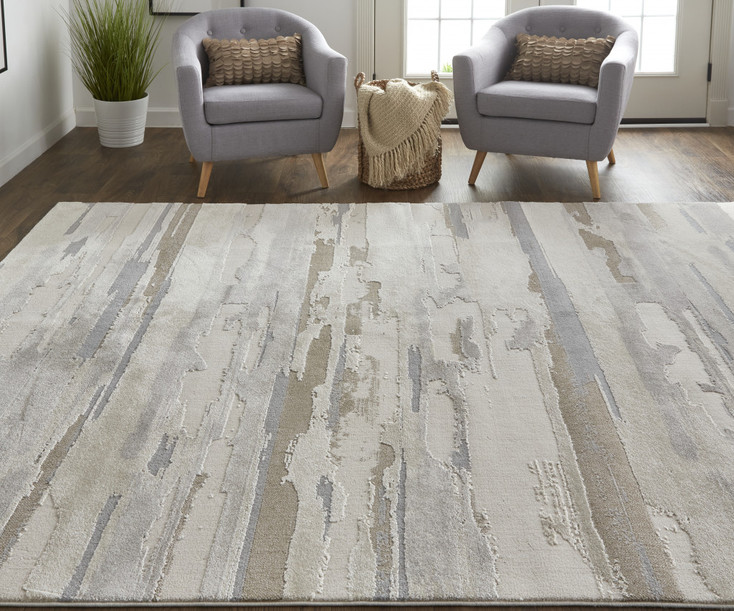 5' x 8' Ivory Tan and Brown Abstract Power Loom Distressed Stain Resistant Area Rug