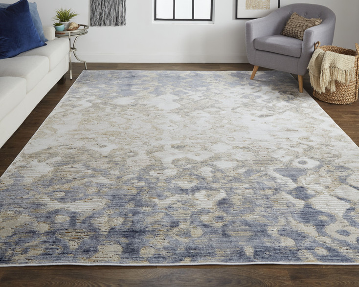 5' x 8' Tan Ivory and Blue Abstract Power Loom Distressed Area Rug