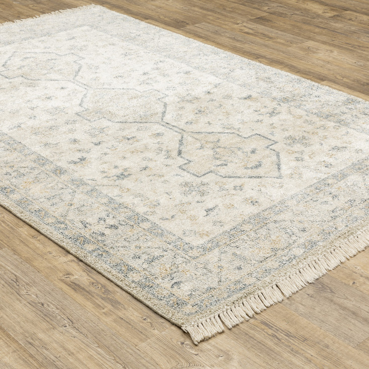 5' x 8' Beige and Charcoal Oriental Hand Loomed Stain Resistant Area Rug with Fringe