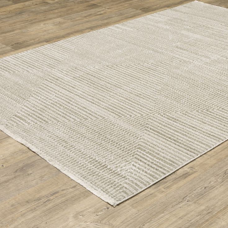 5' x 8' Ivory Beige Taupe and Tan Geometric Power Loom Area Rug with Fringe