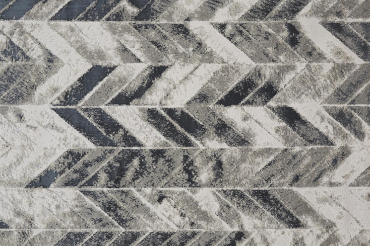 5' x 8' Black Gray and Silver Geometric Stain Resistant Area Rug
