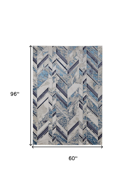 5' x 8' Ivory Blue and Gray Chevron Power Loom Distressed Area Rug