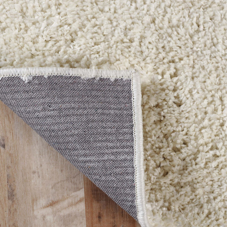 5' x 8' Ivory Shag Stain Resistant Area Rug