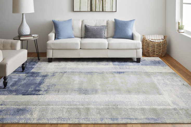 5' x 8' Blue Green and Ivory Abstract Power Loom Distressed Area Rug