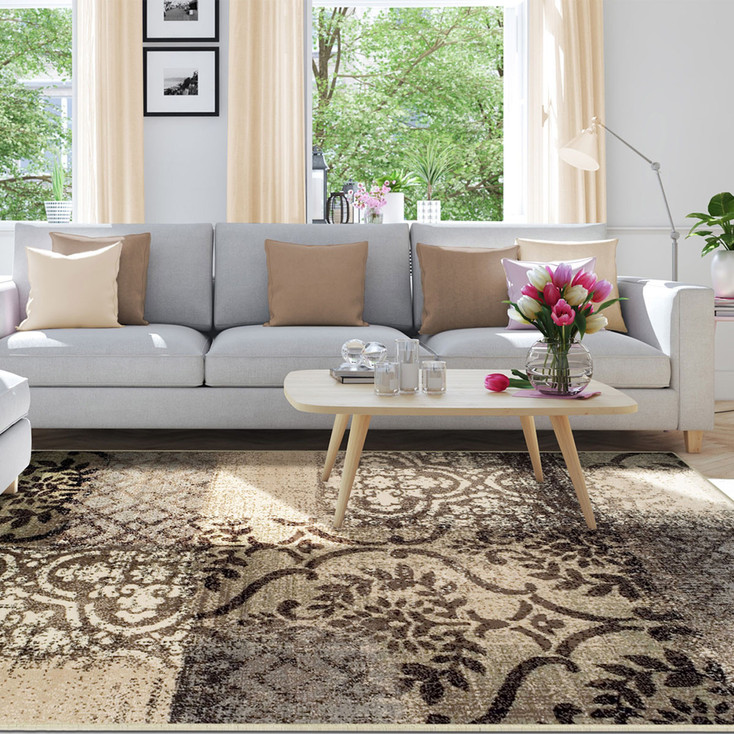 5' x 8' Tan and Brown Damask Distressed Stain Resistant Area Rug
