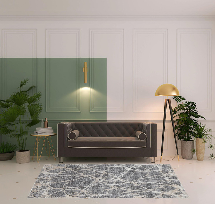 5' x 8' Gray and Ivory Abstract Power Loom Stain Resistant Area Rug