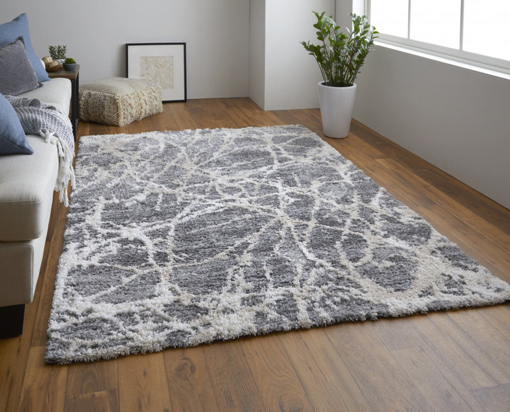 5' x 8' Gray and Ivory Abstract Power Loom Stain Resistant Area Rug