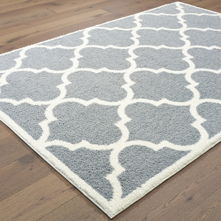 5' x 8' Grey and Ivory Geometric Shag Power Loom Stain Resistant Area Rug