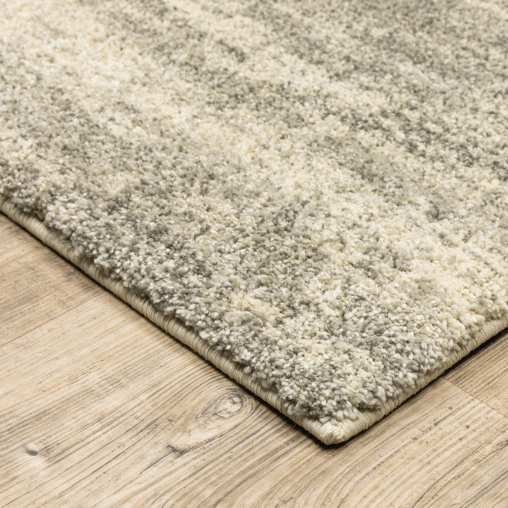 5' x 8' Grey Beige and Tan Abstract Power Loom Stain Resistant Area Rug