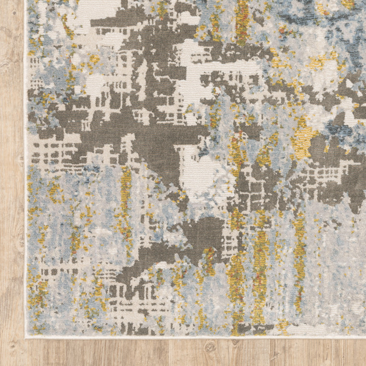 5' x 8' Grey Blue Beige Gold and Rust Abstract Power Loom Stain Resistant Area Rug