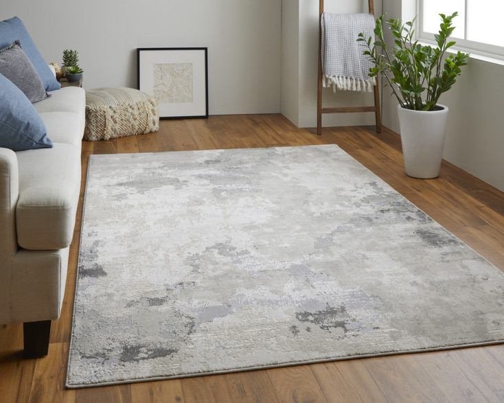 5' x 8' Ivory and Gray Abstract Stain Resistant Area Rug