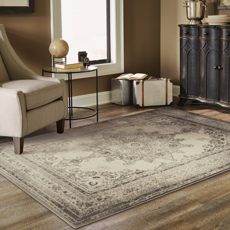 5' x 8' Ivory and Gray Pale Medallion Area Rug