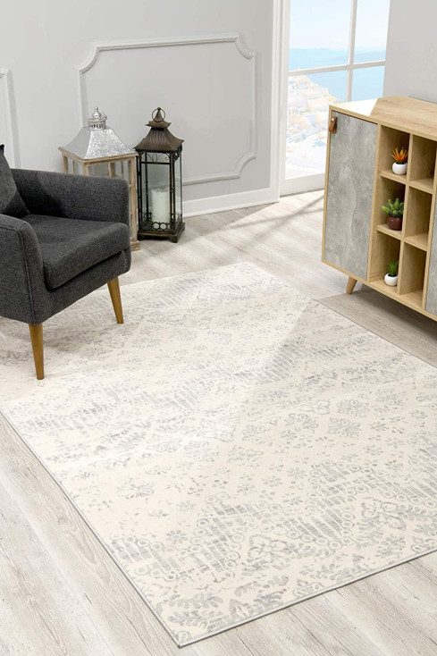5' x 8' Ivory Distressed Ikat Pattern Area Rug