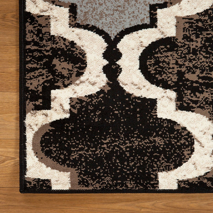 5' x 8' Chocolate Quatrefoil Power Loom Distressed Stain Resistant Area Rug