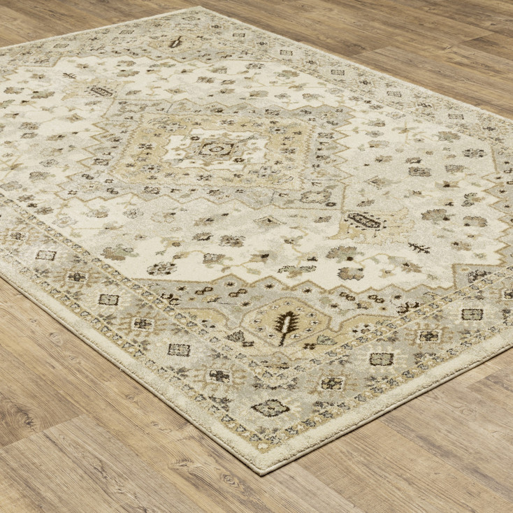 6' x 9' Beige Grey Tan and Brown Oriental Power Loom Stain Resistant Area Rug