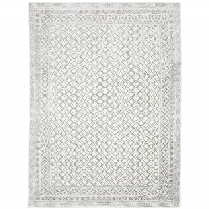 6' x 9' White and Grey Oriental Power Loom Stain Resistant Area Rug