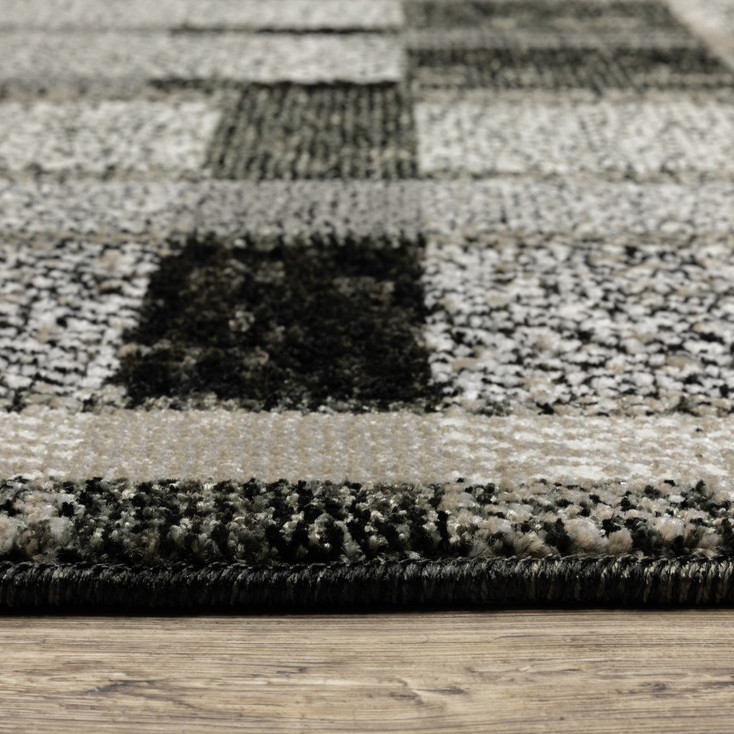 6' x 9' Black Grey and Ivory Geometric Power Loom Stain Resistant Area Rug