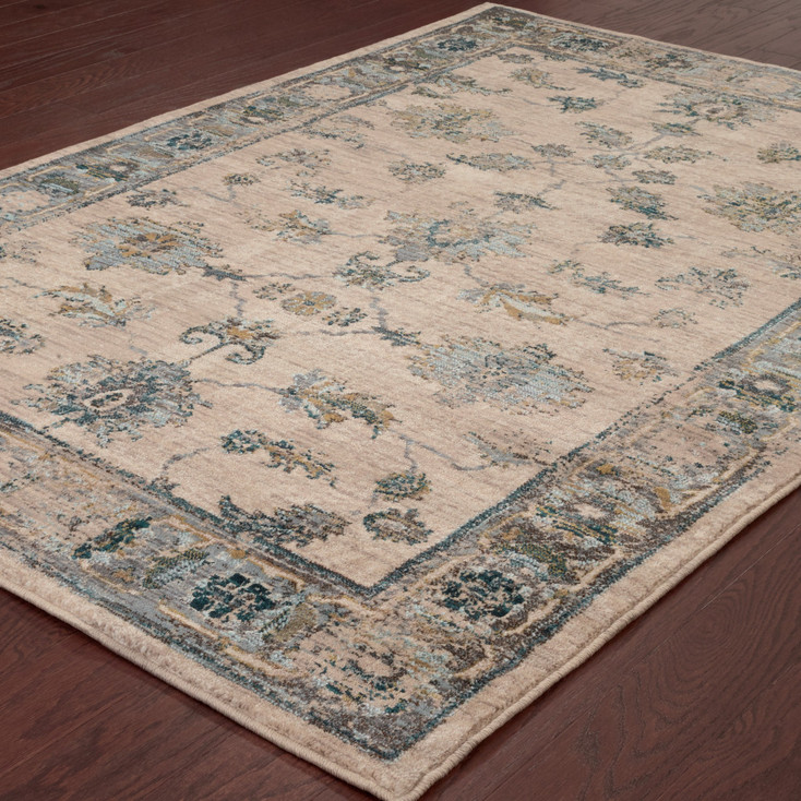 6' x 9' Ivory Blue Gold and Grey Oriental Power Loom Stain Resistant Area Rug