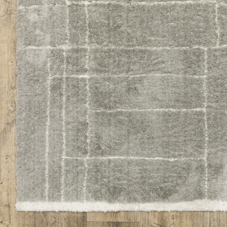 6' x 9' Grey & Ivory Geometric Shag Power Loom Stain Resistant Area Rug