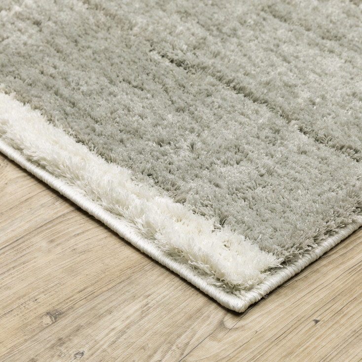 6' x 9' Grey & Ivory Geometric Shag Power Loom Stain Resistant Area Rug