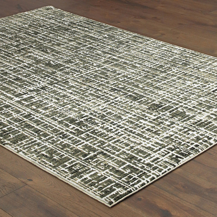 6' x 9' Grey and Ivory Abstract Power Loom Stain Resistant Area Rug