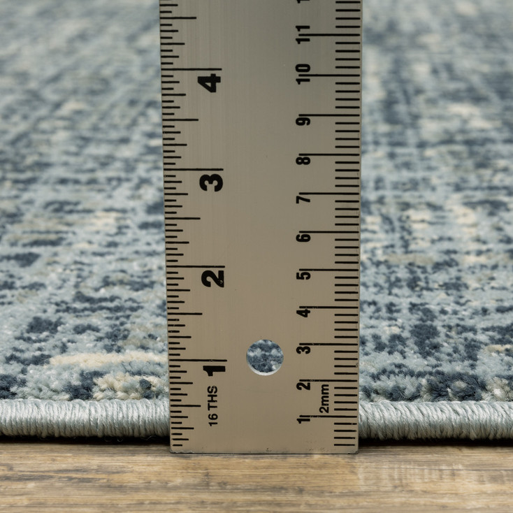 6' x 9' Dark Blue Light Blue Grey Ivory and Beige Abstract Power Loom Area Rug