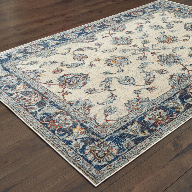 6' x 9' Ivory and Blue Oriental Power Loom Stain Resistant Area Rug