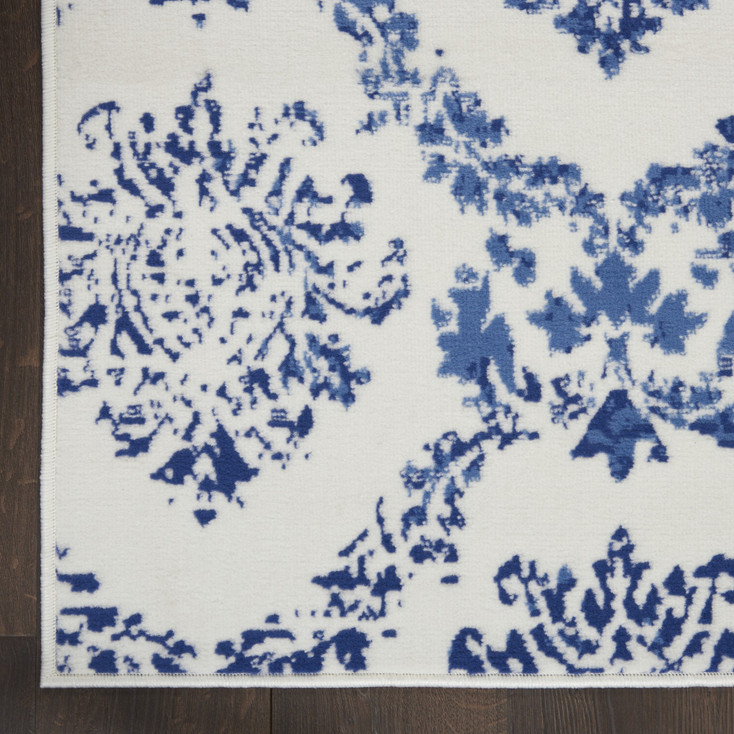 6' x 9' Blue & Ivory Floral Dhurrie Area Rug