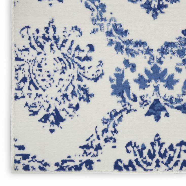 6' x 9' Blue & Ivory Floral Dhurrie Area Rug