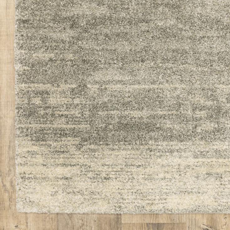 6' x 9' Grey Beige and Tan Abstract Power Loom Stain Resistant Area Rug