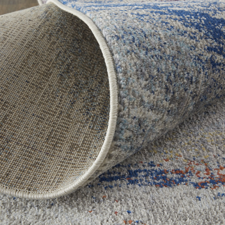 7' x 10' Blue Gray and Orange Abstract Power Loom Stain Resistant Area Rug