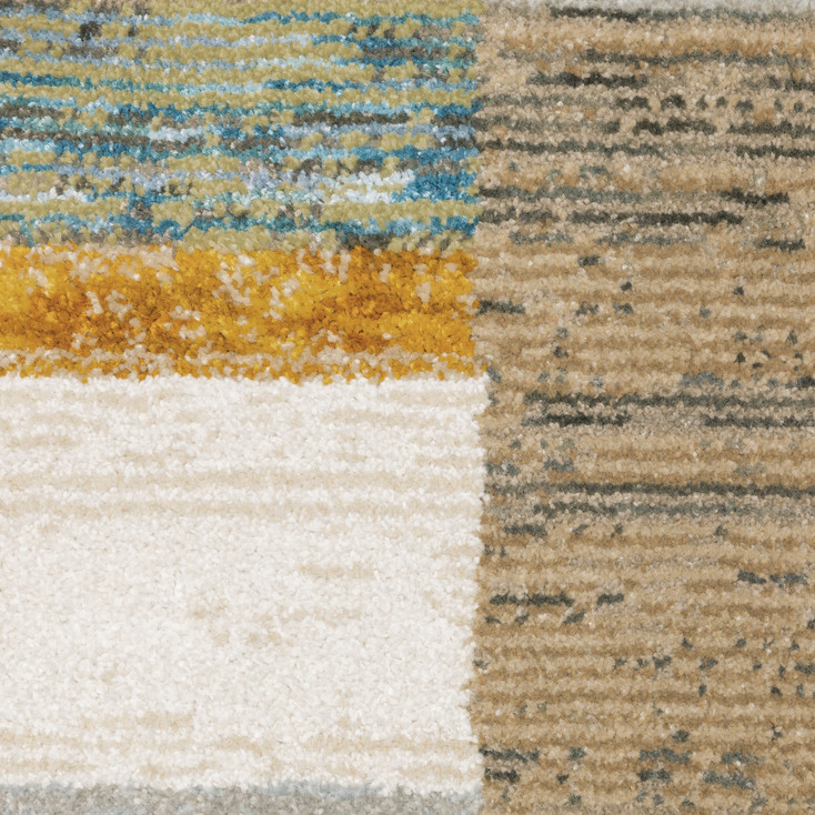 7' x 10' Beige Gold Black Grey Tan Teal and Rust Geometric Power Loom Area Rug