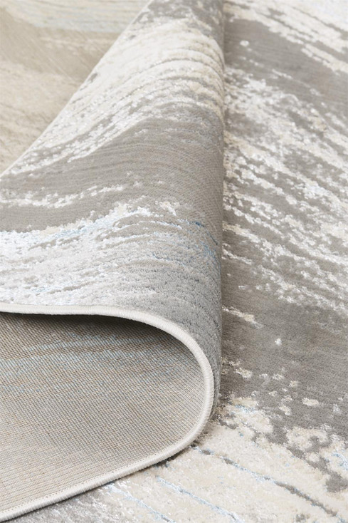 7' x 10' Gray Ivory and Blue Abstract Stain Resistant Area Rug
