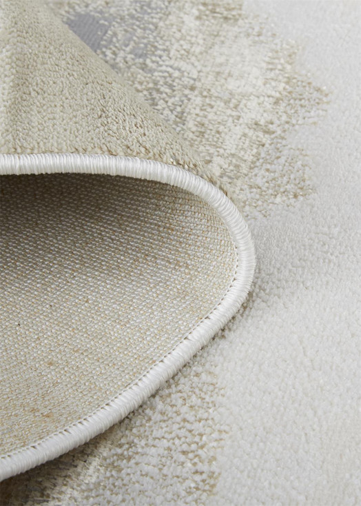 7' x 10' Ivory Tan and Gray Abstract Stain Resistant Area Rug