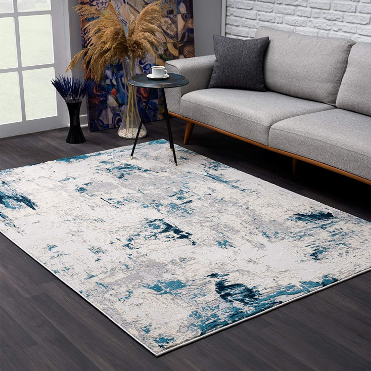 7' x 10' Blue and Ivory Abstract Strokes Area Rug