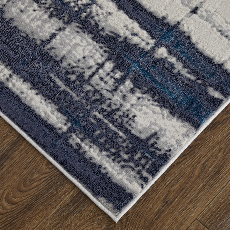 7' x 10' Ivory Blue and Gray Abstract Power Loom Distressed Area Rug