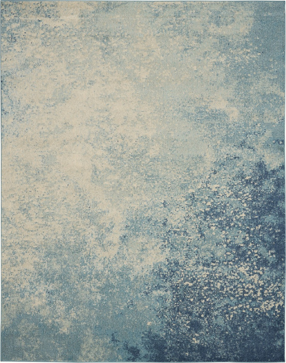 7' x 10' Ivory & Blue Abstract Power Loom Polypropylene Area Rug