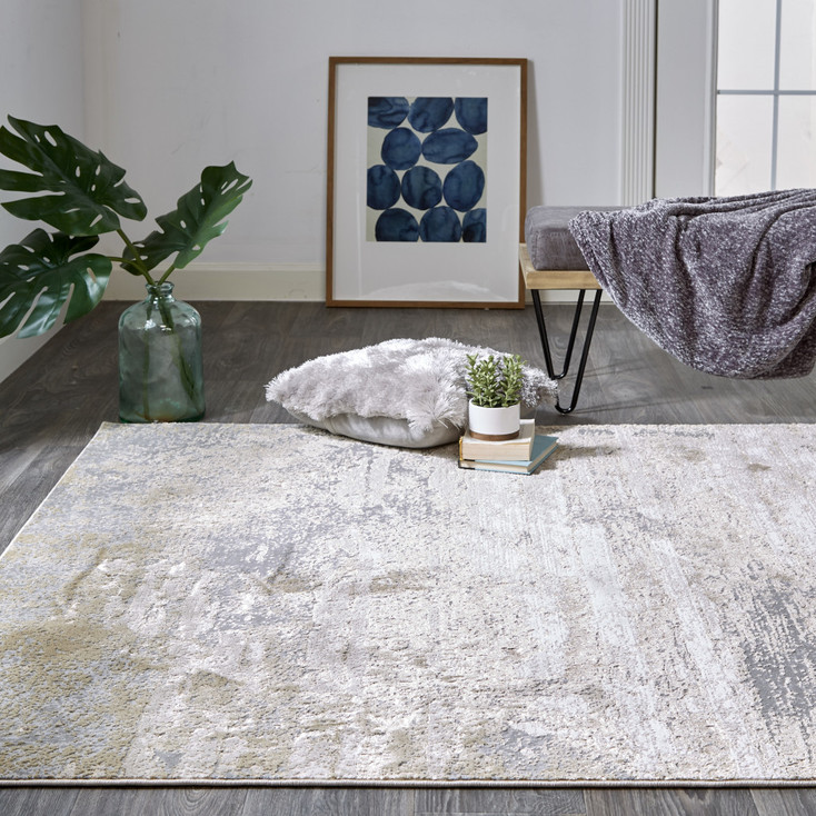 7' x 10' Ivory Gold and Gray Abstract Stain Resistant Area Rug