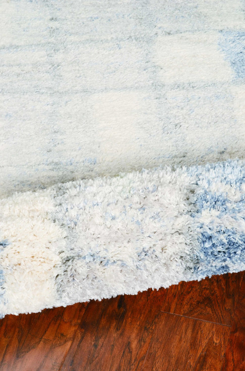 7' x 9' Polypropylene Ivory or Blue Area Rug