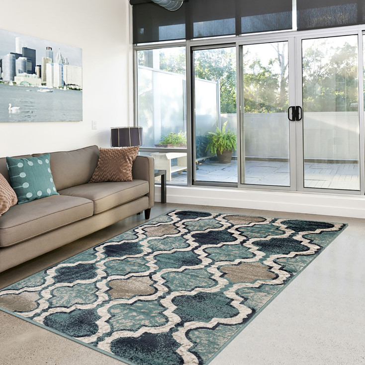 7' x 9' Deep Royal Quatrefoil Power Loom Distressed Stain Resistant Area Rug