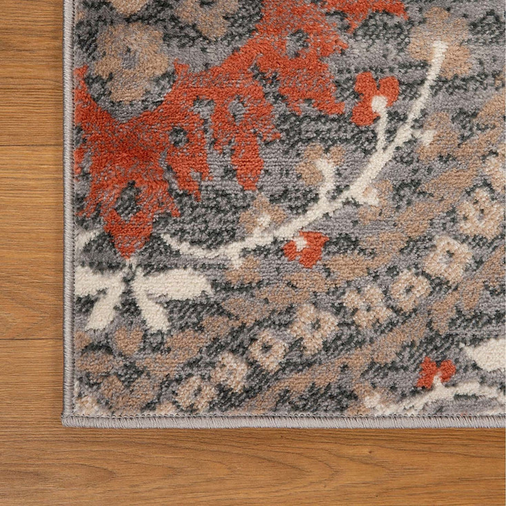 7' x 9' Rust Floral Stain Resistant Area Rug